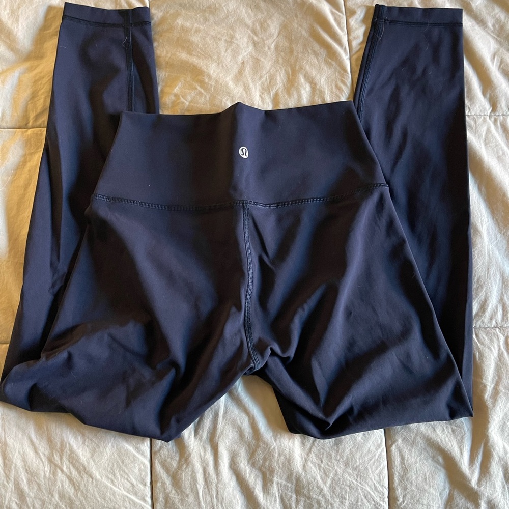Lululemon 
Size: 6 high-rise
Color: navy 
Inseam: 28”